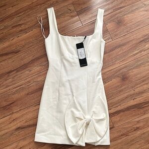 Elegant Cream Dress with Bow Detail